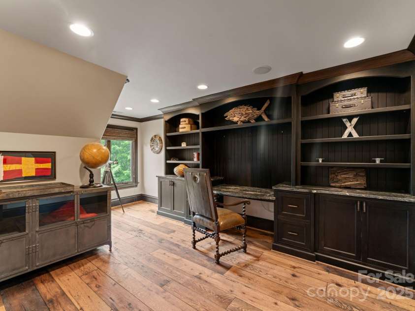 172 Tennessee Circle, Mooresville, NC 28117.  MLS# CAR4252701, YatesRealty ID 1230. Upper-Level Office with built-ins and a ladder to the loft and attic storage.