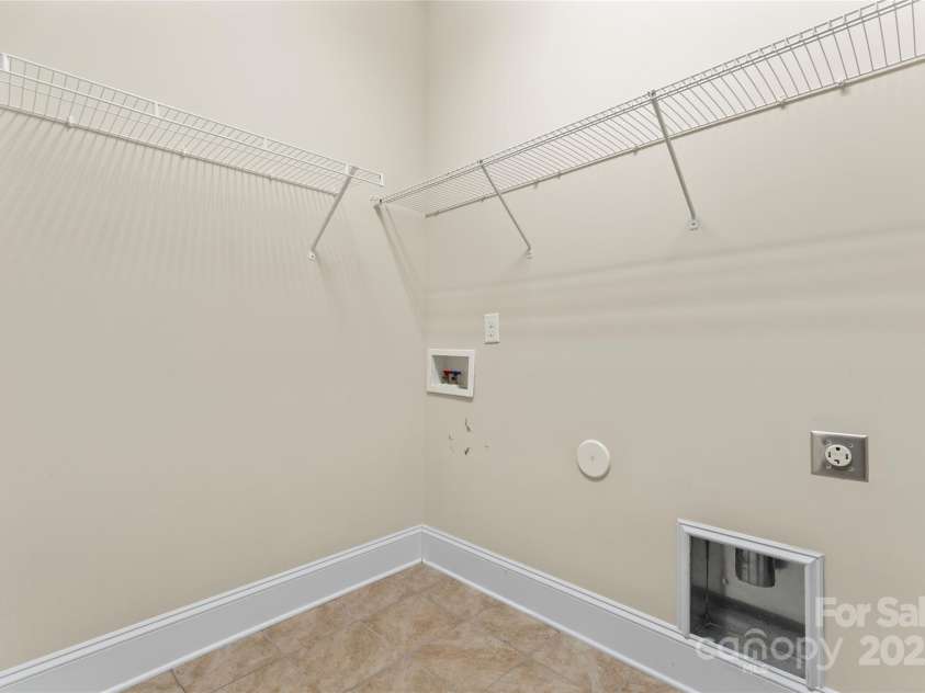 11604 Bradford Park Drive, Davidson, NC 28036.  MLS# CAR4222363, YatesRealty ID 12303. Laundry room on main level
