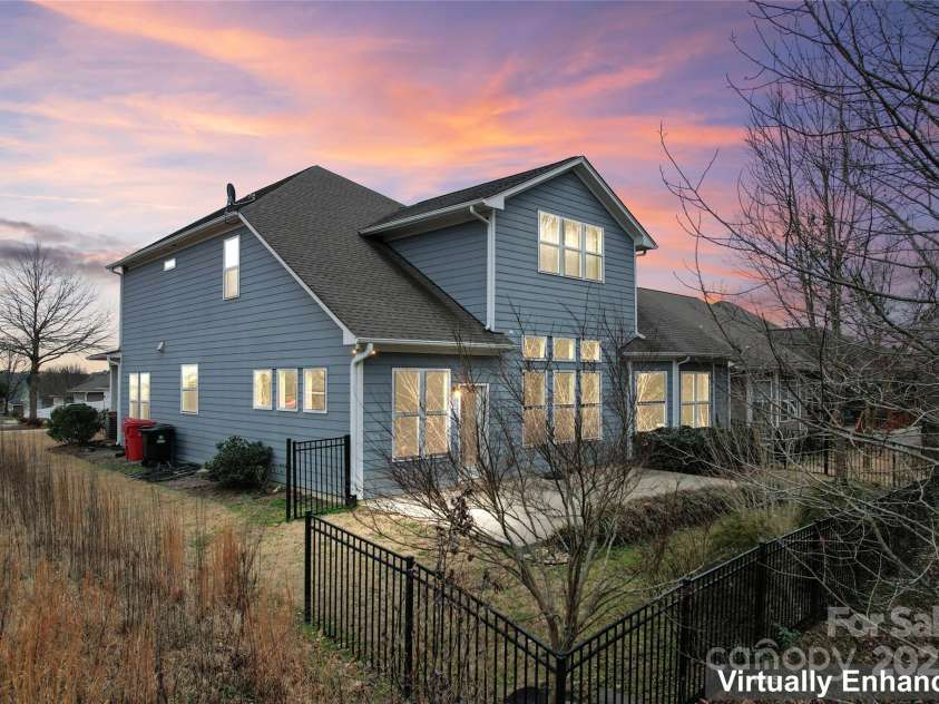 11604 Bradford Park Drive, Davidson, NC 28036.  MLS# CAR4222363, YatesRealty ID 12303. Side  back view