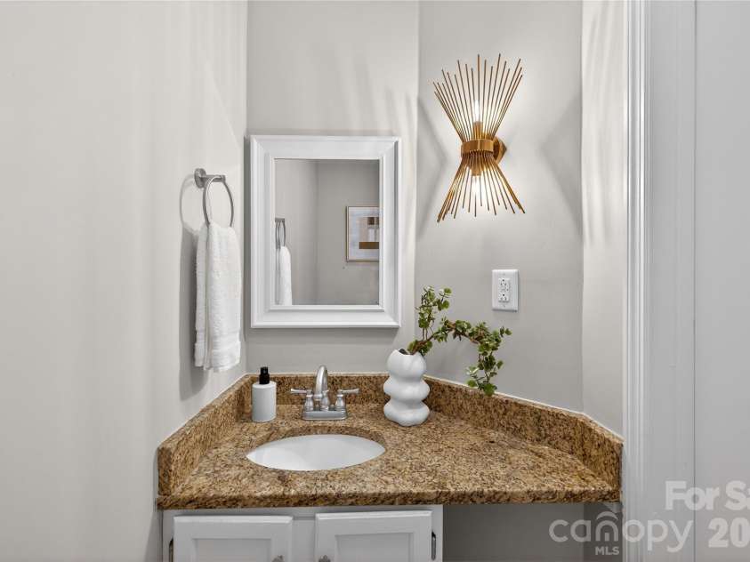 311 Silverleaf Circle, Kannapolis, NC 28083.  MLS# CAR4366595, YatesRealty ID 12305. Half bath downstairs