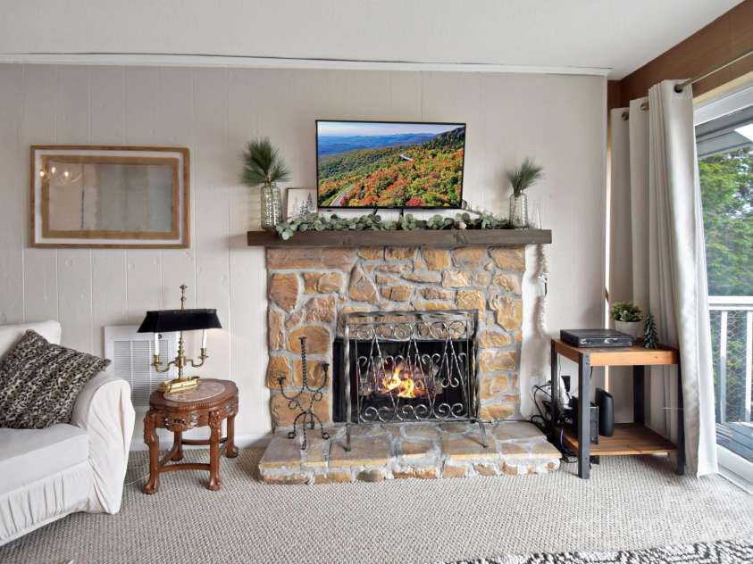 367 Skyleaf Drive, Banner Elk, NC 28604.  MLS# CAR4251134, YatesRealty ID 1231. Stone Fireplace in Living Room