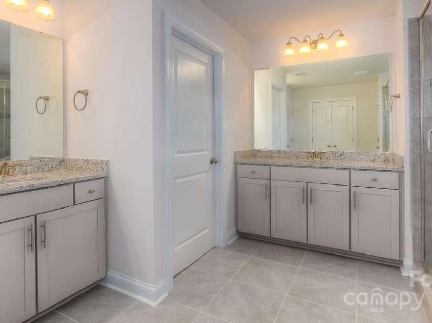 546 Fox Cove Road, Hendersonville, NC 28792.  MLS# CAR4200624, YatesRealty ID 12313. Owners Bath with dual vanities