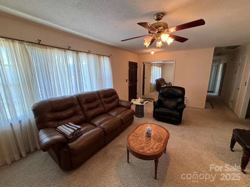 141 Cherokee Way, Marion, NC 28752.  MLS# CAR4199909, YatesRealty ID 12315. Living room