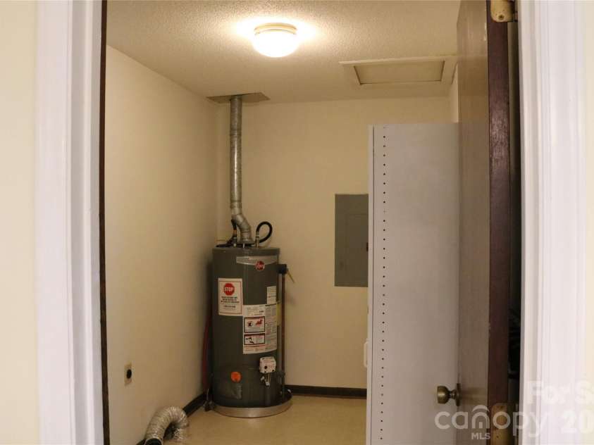 120 Oakley Drive, Gastonia, NC 28052.  MLS# CAR4317380, YatesRealty ID 12318. Almost new gas hot water heater in the laundry room 
