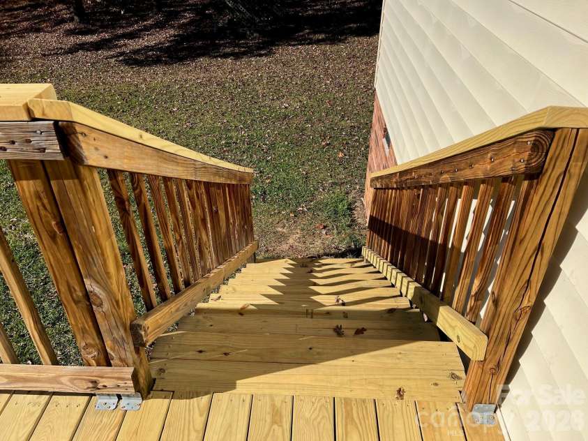 120 Oakley Drive, Gastonia, NC 28052.  MLS# CAR4317380, YatesRealty ID 12318. New deck stairs 
