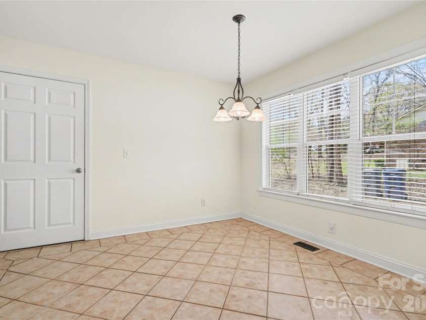437 Hillcrest Drive, Harrisburg, NC 28075.  MLS# CAR4360523, YatesRealty ID 12320. Breakfast room off the kitchen