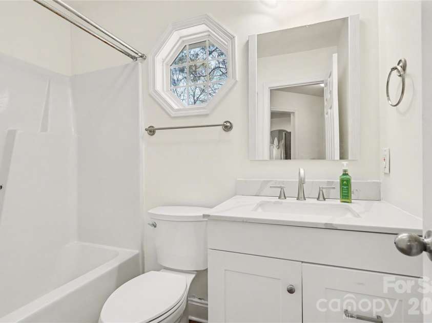 437 Hillcrest Drive, Harrisburg, NC 28075.  MLS# CAR4360523, YatesRealty ID 12320. Hall bath downstairs