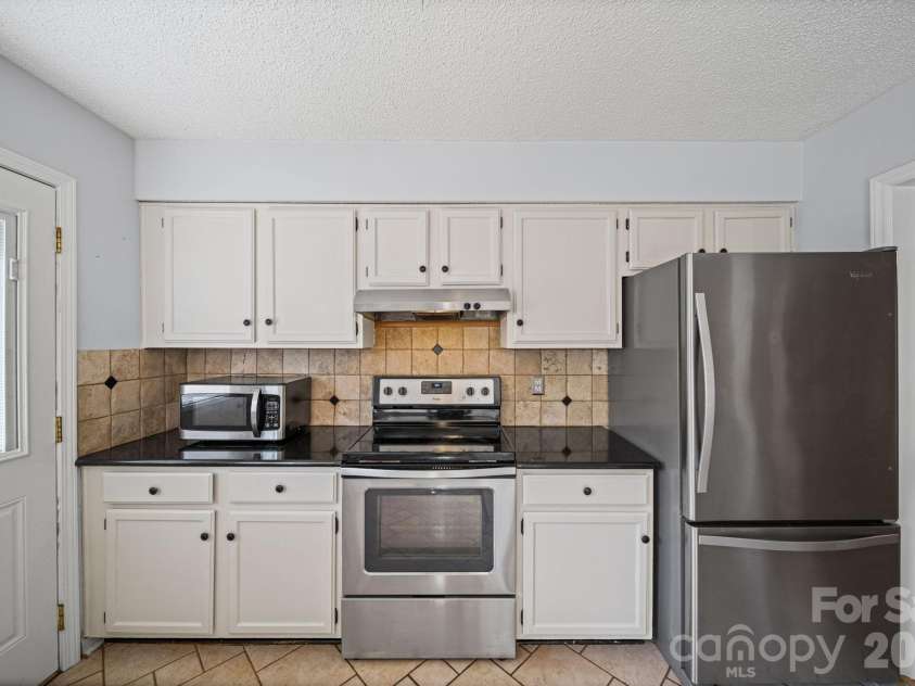 9811 Dusty Cedar Court, Charlotte, NC 28269.  MLS# CAR4368771, YatesRealty ID 12321. 