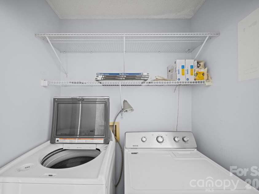 9811 Dusty Cedar Court, Charlotte, NC 28269.  MLS# CAR4368771, YatesRealty ID 12321. Laundry Closet