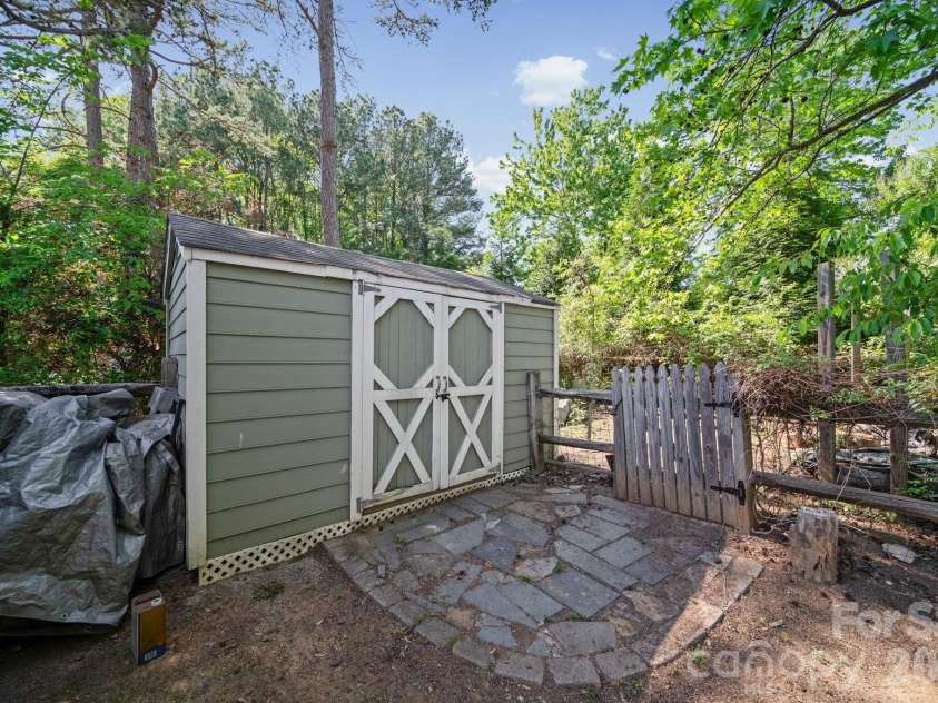 9811 Dusty Cedar Court, Charlotte, NC 28269.  MLS# CAR4368771, YatesRealty ID 12321. Storage Shed