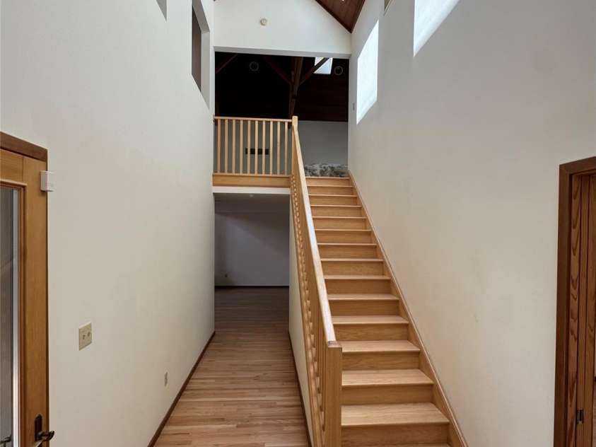 7 Winding Poplar Road, Black Mountain, NC 28711.  MLS# CAR4285345, YatesRealty ID 12326. Foyer looking up to Loft