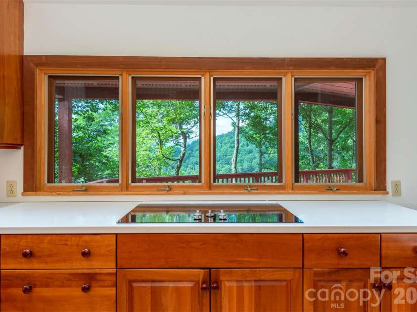 7 Winding Poplar Road, Black Mountain, NC 28711.  MLS# CAR4285345, YatesRealty ID 12326. Nice view while preparing a meal.