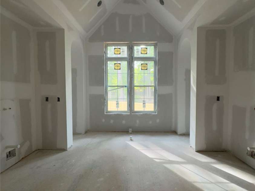 3030 Brookridge Lane, Charlotte, NC 28211.  MLS# CAR4250831, YatesRealty ID 12328. Primary bath features vaulted ceilings that will have beam and shiplap details, large soaking tub that is complimented with arch niches w/ white oak shelving creating a spa inspired experience everyday.