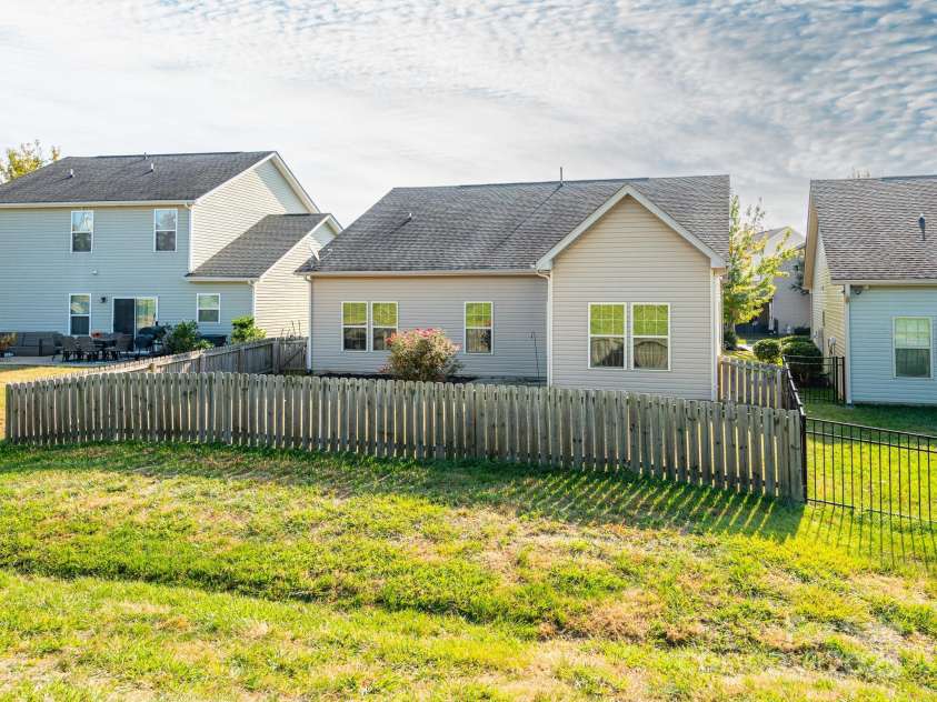 1691 Mill Creek Lane, Concord, NC 28025.  MLS# CAR4192669, YatesRealty ID 12329. Backyard