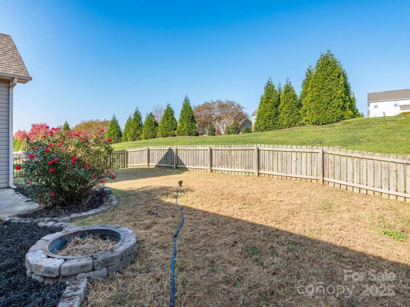 1691 Mill Creek Lane, Concord, NC 28025.  MLS# CAR4192669, YatesRealty ID 12329. Backyard