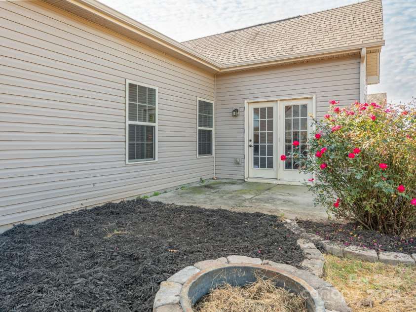 1691 Mill Creek Lane, Concord, NC 28025.  MLS# CAR4192669, YatesRealty ID 12329. Backyard Patio