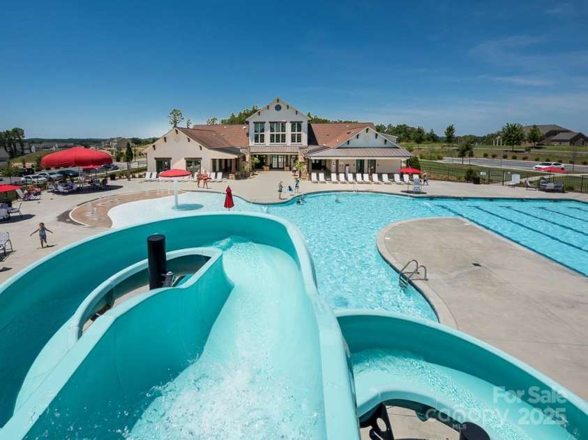 1691 Mill Creek Lane, Concord, NC 28025.  MLS# CAR4192669, YatesRealty ID 12329. Community Amenities - Outdoor pool w/ waterslide & clubhouse