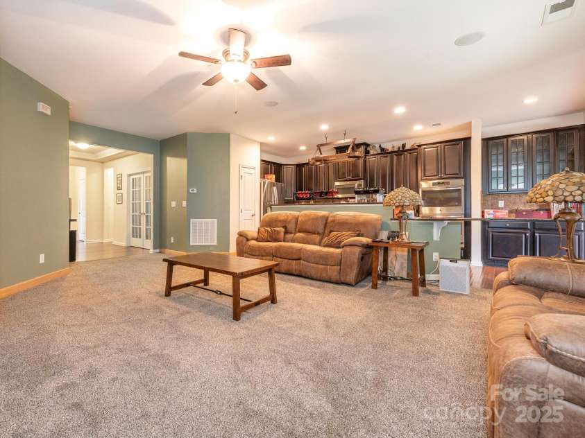 1691 Mill Creek Lane, Concord, NC 28025.  MLS# CAR4192669, YatesRealty ID 12329. Open Concept Kitchen and Living Room