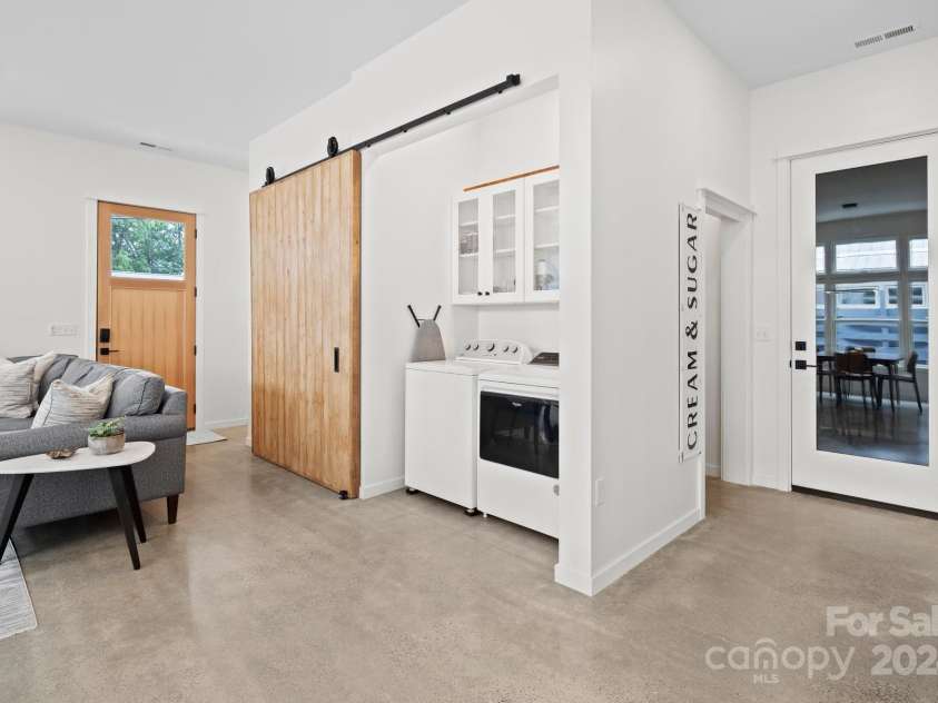 605 Hiawassee Avenue, Black Mountain, NC 28711.  MLS# CAR4202408, YatesRealty ID 12331. Laundry Closet w/ Barn Door