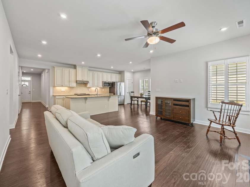 10277 October Glory Way, Charlotte, NC 28215.  MLS# CAR4369336, YatesRealty ID 12332. Great Room and Kitchen