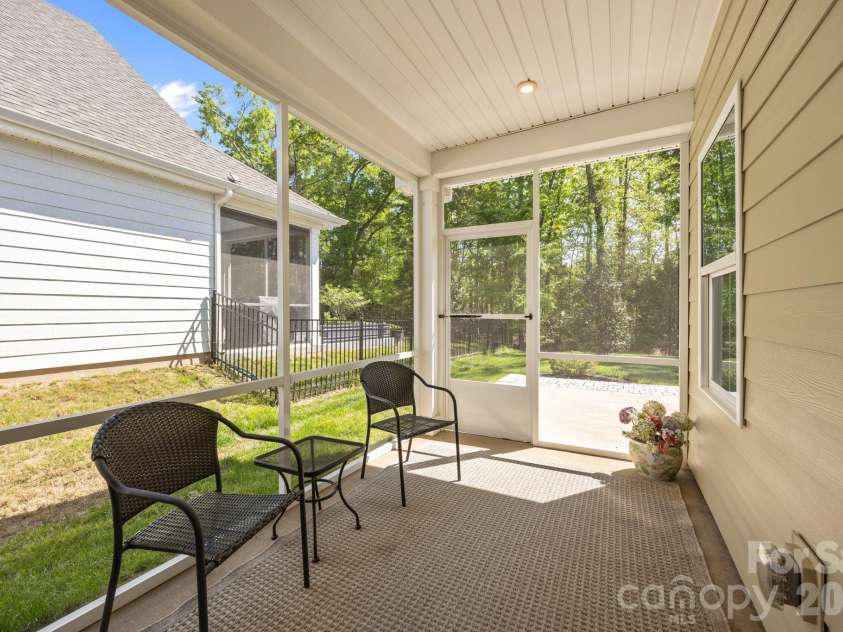 10277 October Glory Way, Charlotte, NC 28215.  MLS# CAR4369336, YatesRealty ID 12332. Screened Porch