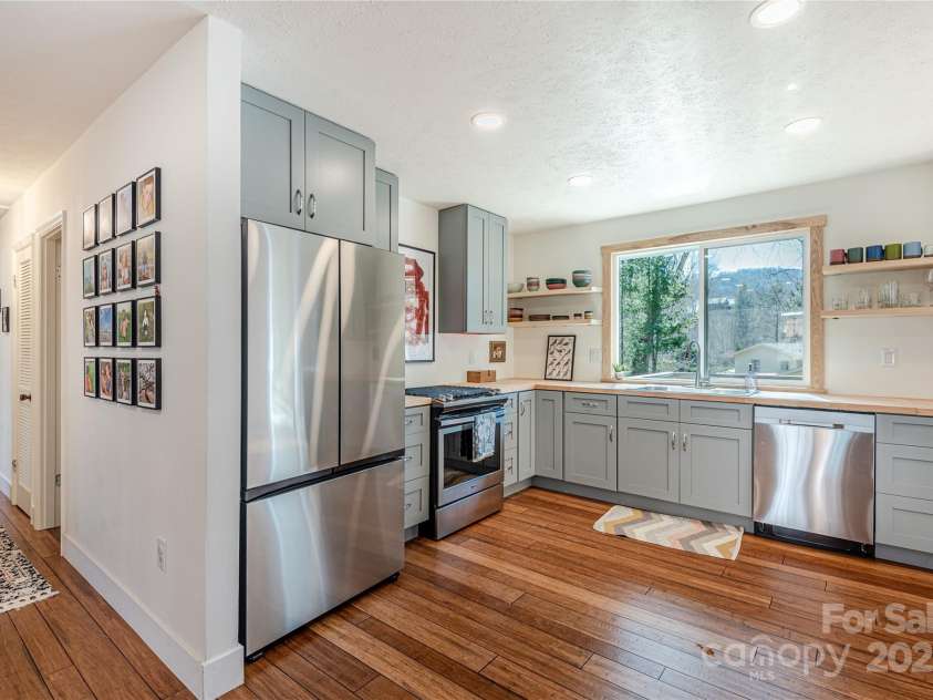 7 Brookcliff Drive, Asheville, NC 28804.  MLS# CAR4224301, YatesRealty ID 12337. Kitchen and hallway