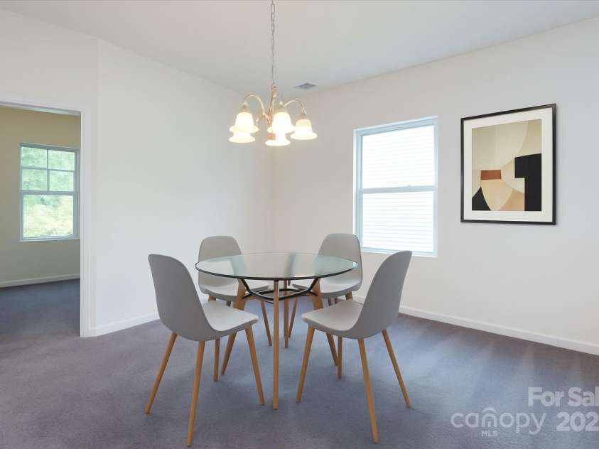 1523 Loropetalum Road, Charlotte, NC 28215.  MLS# CAR4252027, YatesRealty ID 12343. Dinning virtually staged