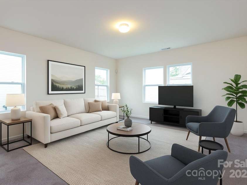 1523 Loropetalum Road, Charlotte, NC 28215.  MLS# CAR4252027, YatesRealty ID 12343. Living room virtually staged
