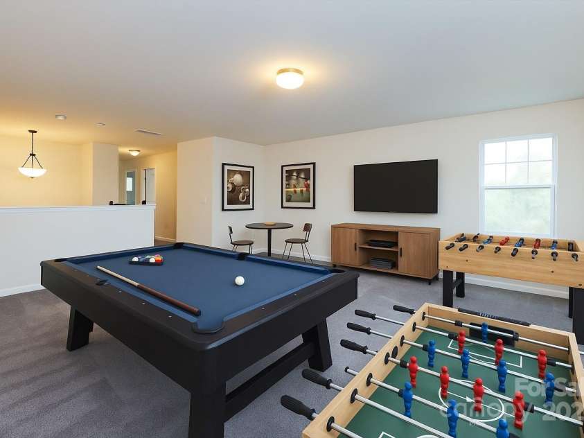 1523 Loropetalum Road, Charlotte, NC 28215.  MLS# CAR4252027, YatesRealty ID 12343. Loft virtually staged