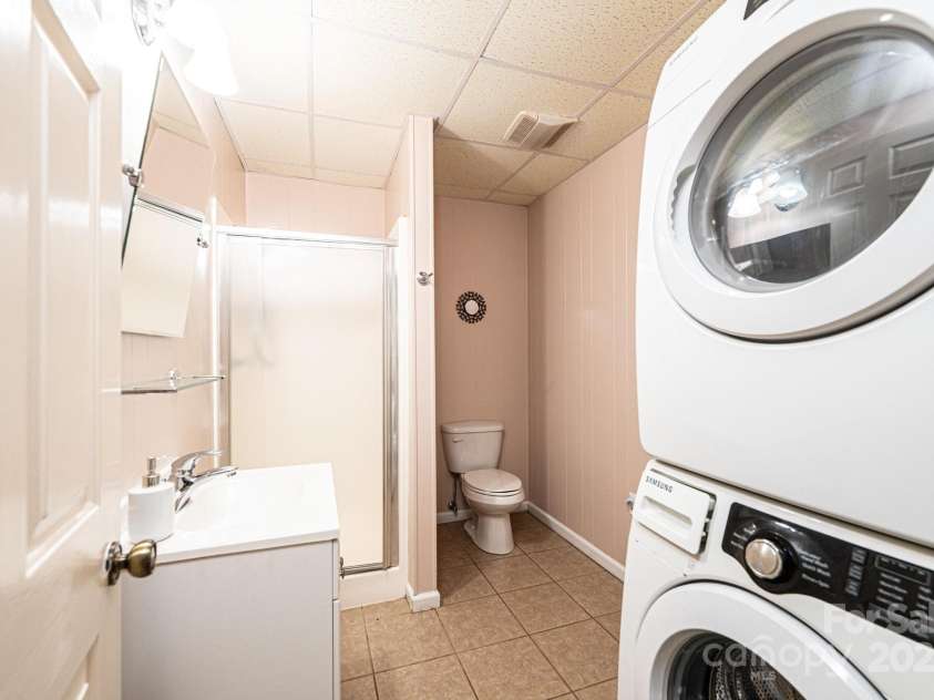 3520 4th Street Boulevard, Hickory, NC 28601.  MLS# CAR4255577, YatesRealty ID 12347. Lower level bathroom, walk in shower, laundry