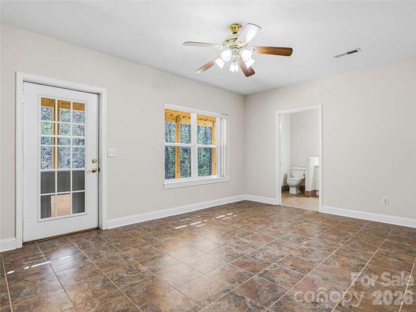 196 Blackbird Lane, Tryon, NC 28782.  MLS# CAR4366022, YatesRealty ID 12349. Full Bathroom, Bedroom and Half Bathroom on Basement Level