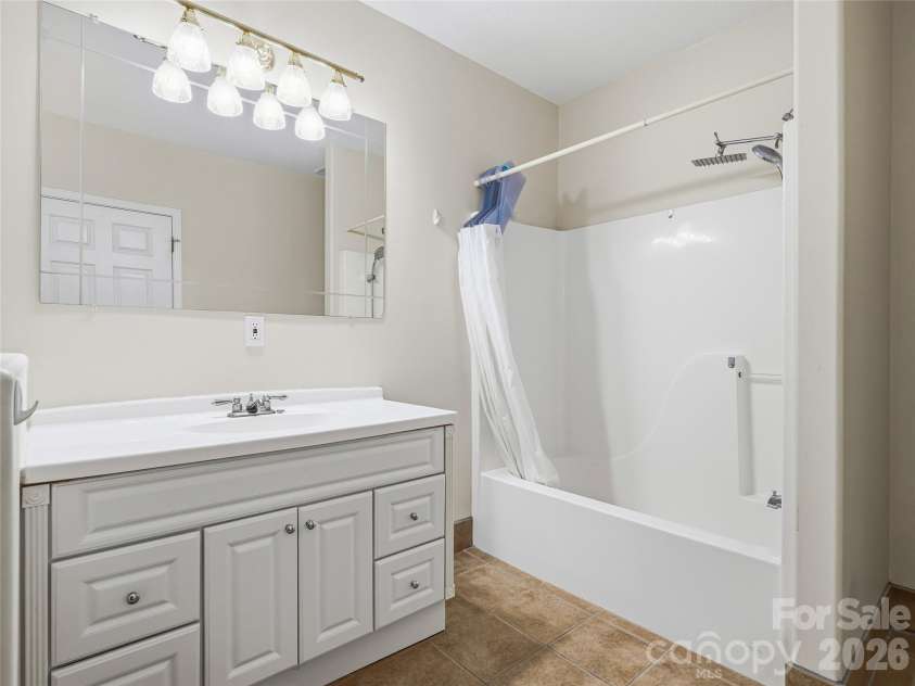 196 Blackbird Lane, Tryon, NC 28782.  MLS# CAR4366022, YatesRealty ID 12349. Full Bathroom on Basement Level