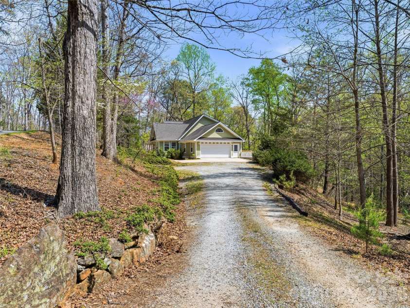 196 Blackbird Lane, Tryon, NC 28782.  MLS# CAR4366022, YatesRealty ID 12349. Inviting Private Driveway