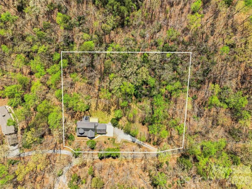 196 Blackbird Lane, Tryon, NC 28782.  MLS# CAR4366022, YatesRealty ID 12349. Lot Lines Are Approximate
