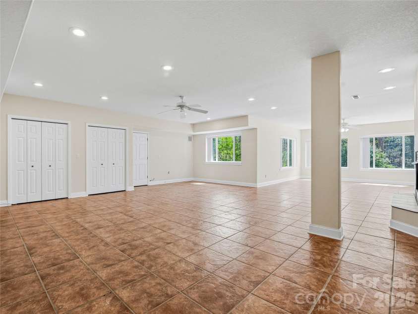 196 Blackbird Lane, Tryon, NC 28782.  MLS# CAR4366022, YatesRealty ID 12349. Walkout Basement
