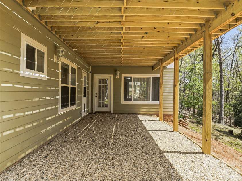 196 Blackbird Lane, Tryon, NC 28782.  MLS# CAR4366022, YatesRealty ID 12349. Walkout Basement