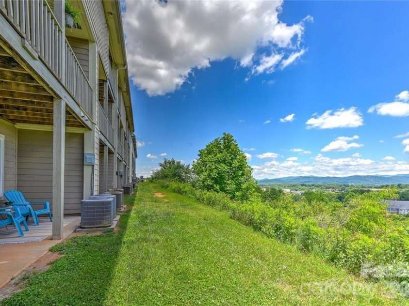 29 Rotunda Circle, Asheville, NC 28806.  MLS# CAR4313720, YatesRealty ID 12350. Lower Level Patio View