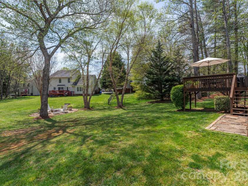 42 Cranberry Bog Court, Fletcher, NC 28732.  MLS# CAR4367619, YatesRealty ID 12351. Back yard overview