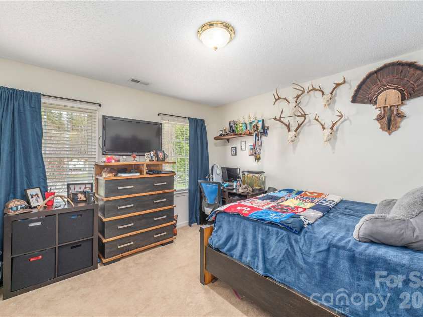 42 Cranberry Bog Court, Fletcher, NC 28732.  MLS# CAR4367619, YatesRealty ID 12351. Bedroom 2 Upper level