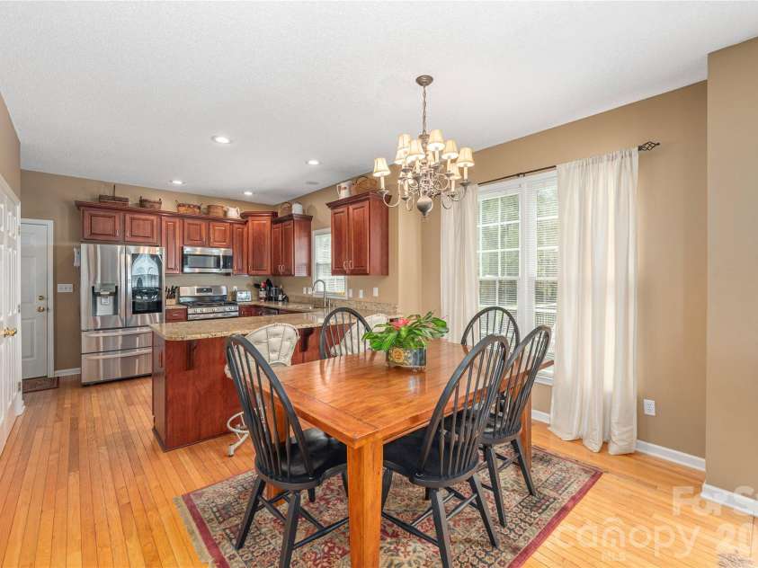 42 Cranberry Bog Court, Fletcher, NC 28732.  MLS# CAR4367619, YatesRealty ID 12351. Breakfast area towards kitchen