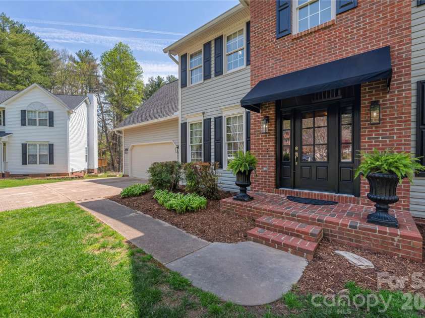 42 Cranberry Bog Court, Fletcher, NC 28732.  MLS# CAR4367619, YatesRealty ID 12351. Exterior front entry