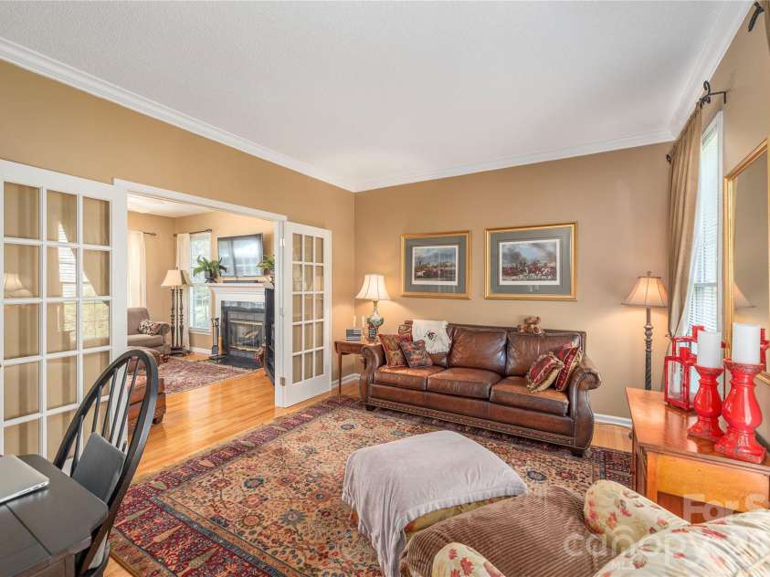 42 Cranberry Bog Court, Fletcher, NC 28732.  MLS# CAR4367619, YatesRealty ID 12351. Front living room 