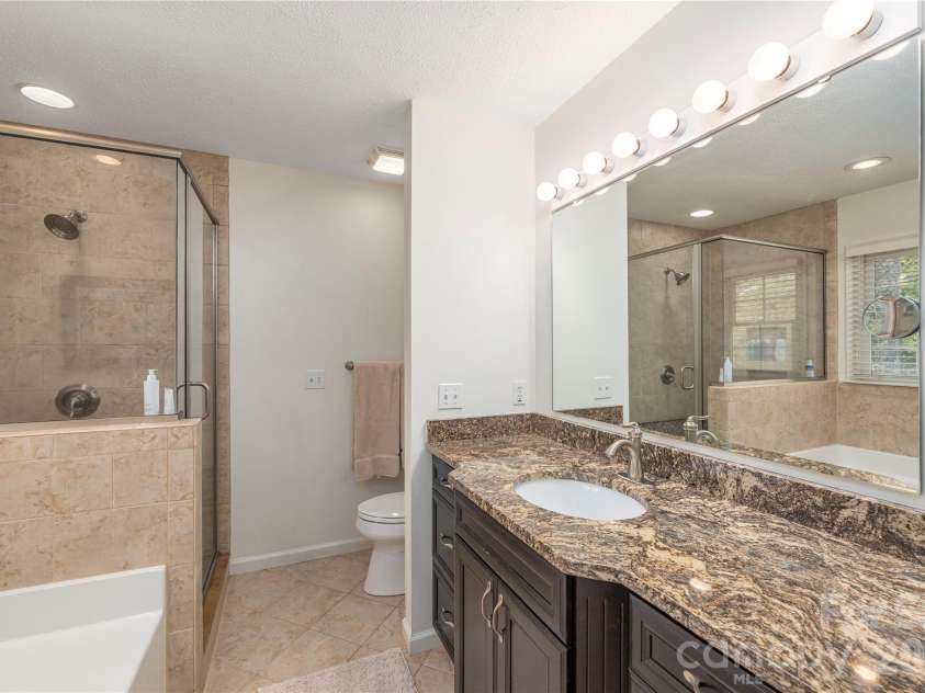 42 Cranberry Bog Court, Fletcher, NC 28732.  MLS# CAR4367619, YatesRealty ID 12351. Master bath 1