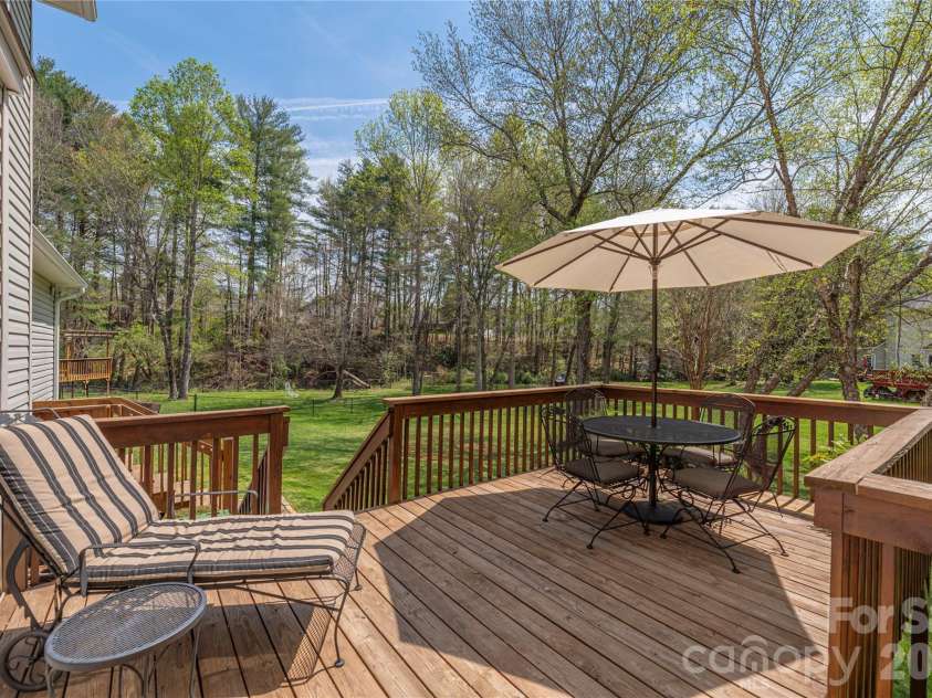 42 Cranberry Bog Court, Fletcher, NC 28732.  MLS# CAR4367619, YatesRealty ID 12351. Rear deck