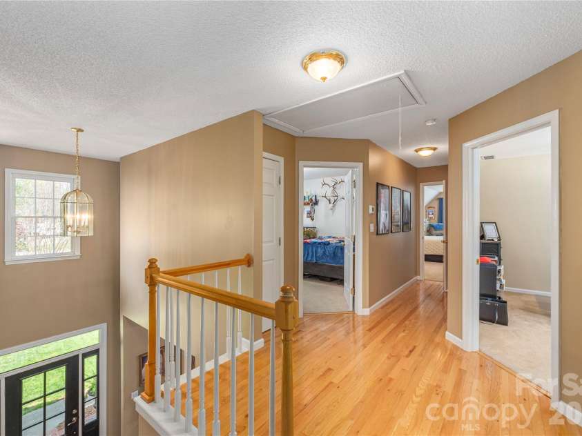 42 Cranberry Bog Court, Fletcher, NC 28732.  MLS# CAR4367619, YatesRealty ID 12351. Upper level landing