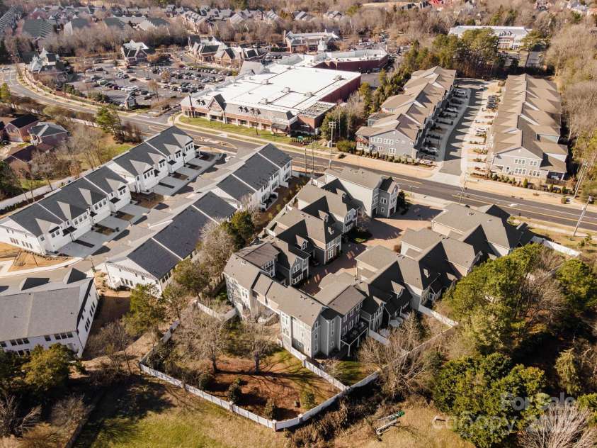 7908 Rea View Court, Charlotte, NC 28226.  MLS# CAR4257499, YatesRealty ID 12354. Aerial view showing the gardens at the back of the complex and how close Colony Place is located.