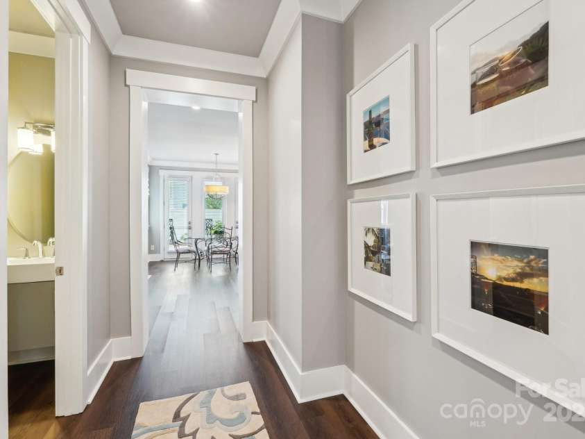 7908 Rea View Court, Charlotte, NC 28226.  MLS# CAR4257499, YatesRealty ID 12354. Alcove leading to Great Room, Kitchen. Powder Room on left.