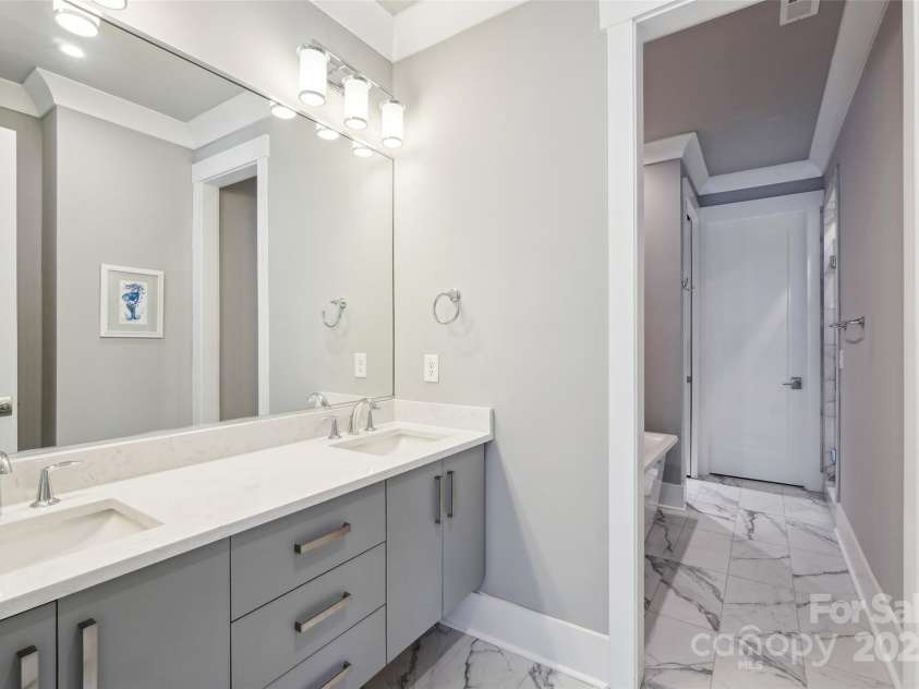 7908 Rea View Court, Charlotte, NC 28226.  MLS# CAR4257499, YatesRealty ID 12354. Downstairs Primary Bathroom