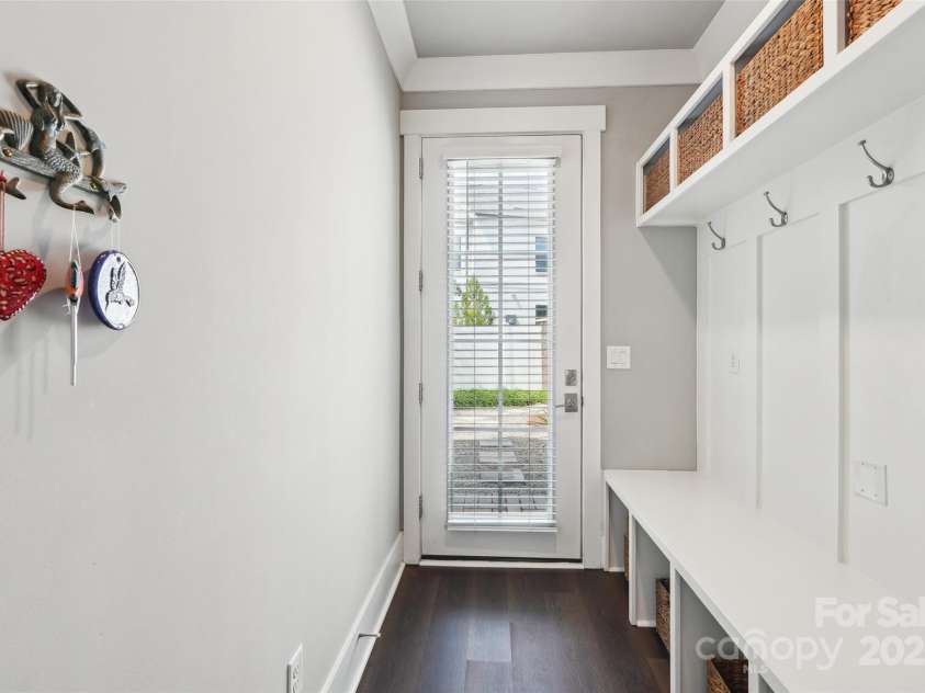 7908 Rea View Court, Charlotte, NC 28226.  MLS# CAR4257499, YatesRealty ID 12354. Drop Zone showing french door to outdoor living.
