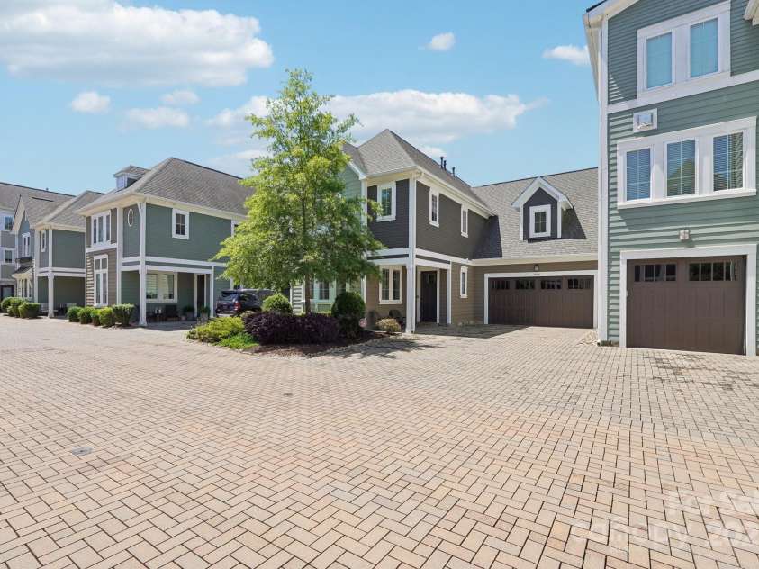 7908 Rea View Court, Charlotte, NC 28226.  MLS# CAR4257499, YatesRealty ID 12354. Front showing brick street and boutique neighborhood.